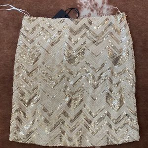 VICI Gold and cream zig zag sequin mini skirt